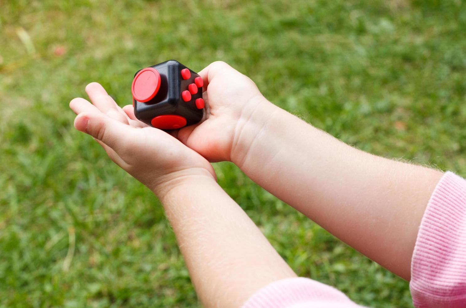 Holding cube fidget photo