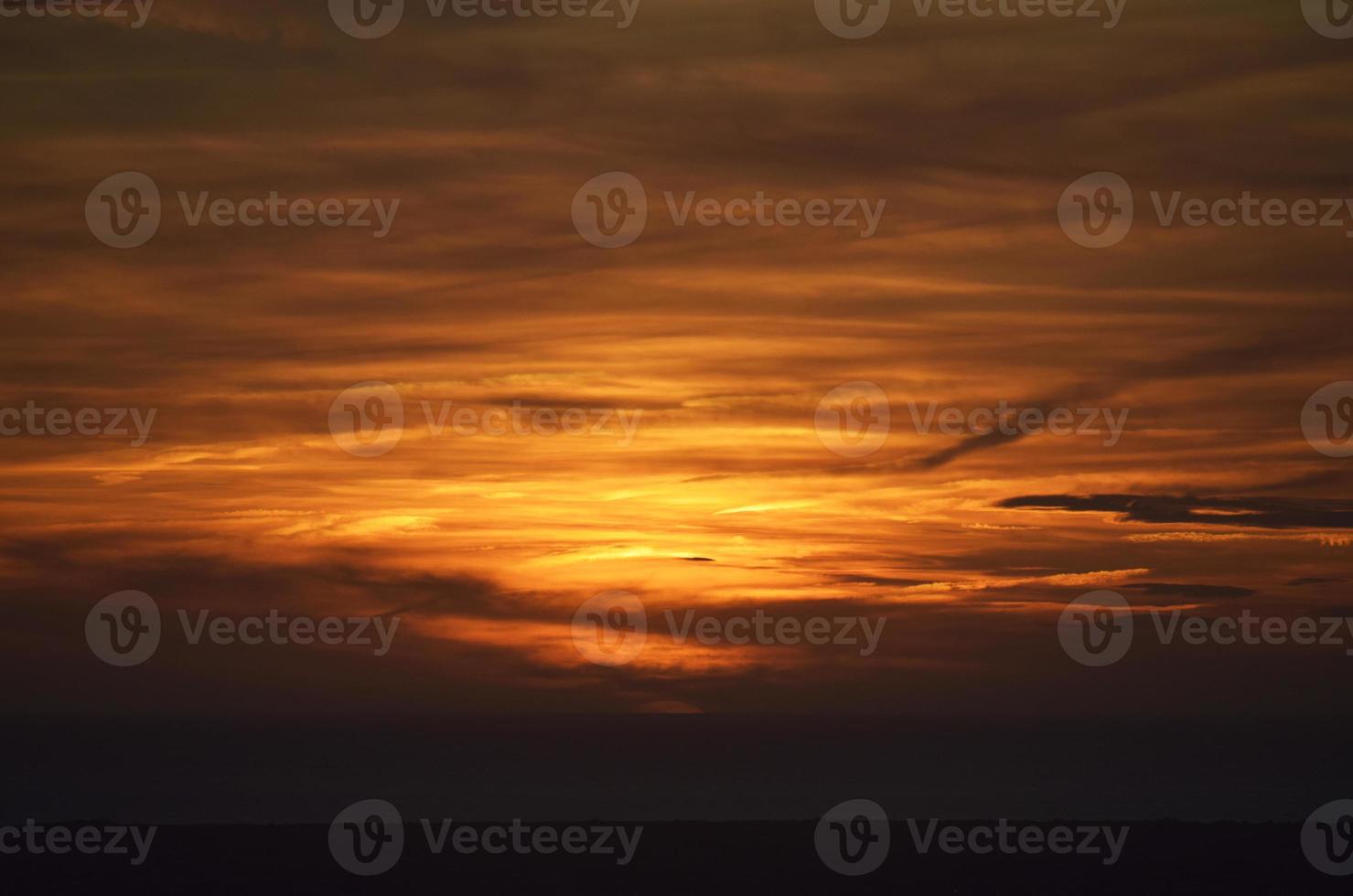 Orange clouds during sunset photo