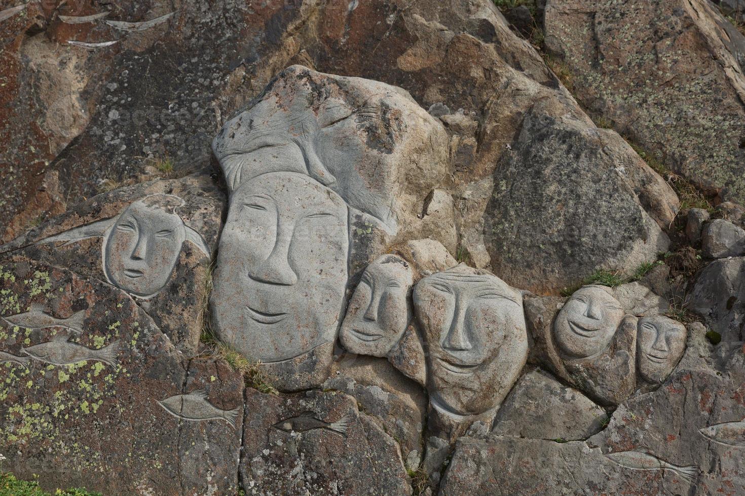Images of whales chiseled into rocks Qaqortoq Greenland photo