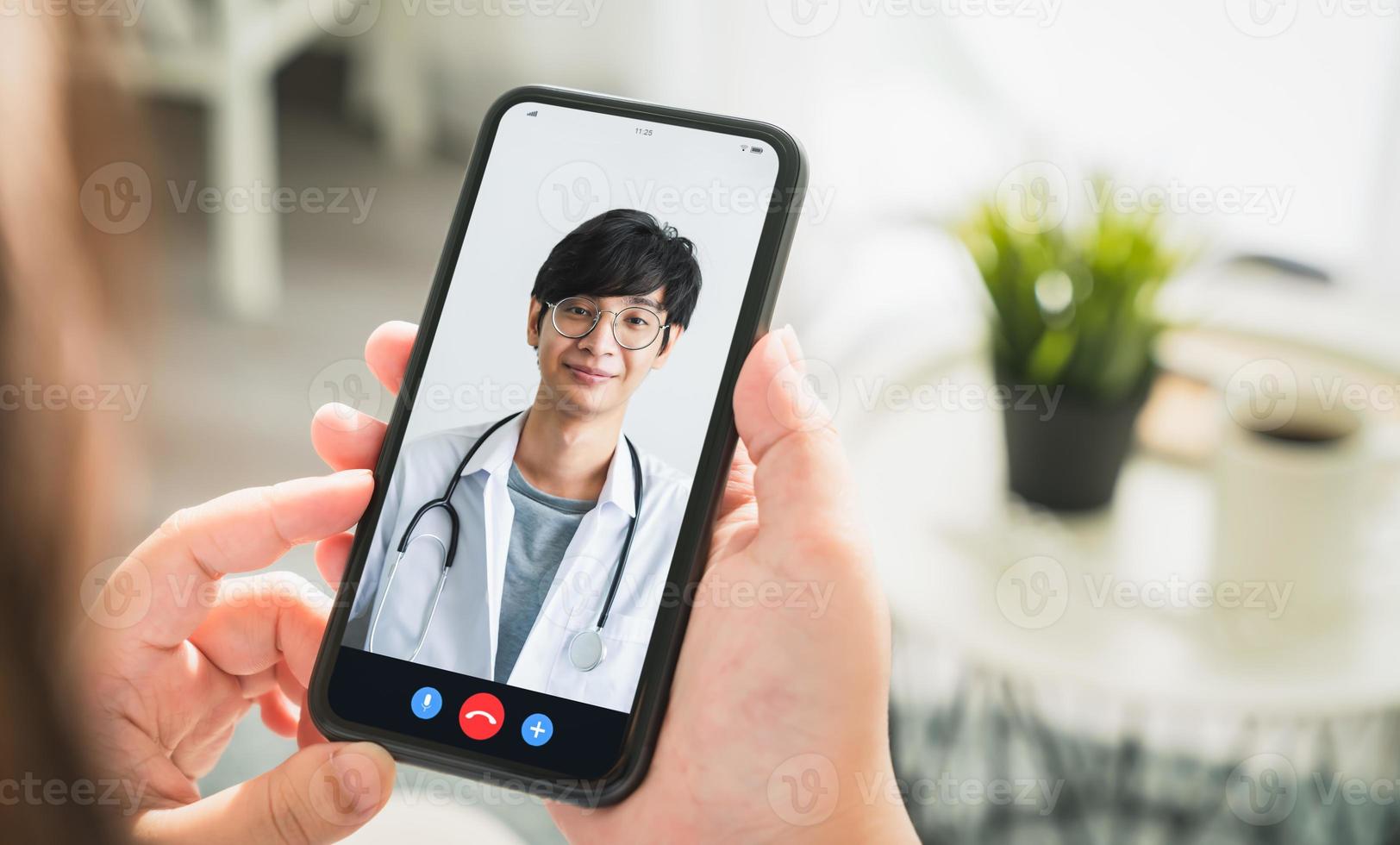 Woman making video call to doctor photo