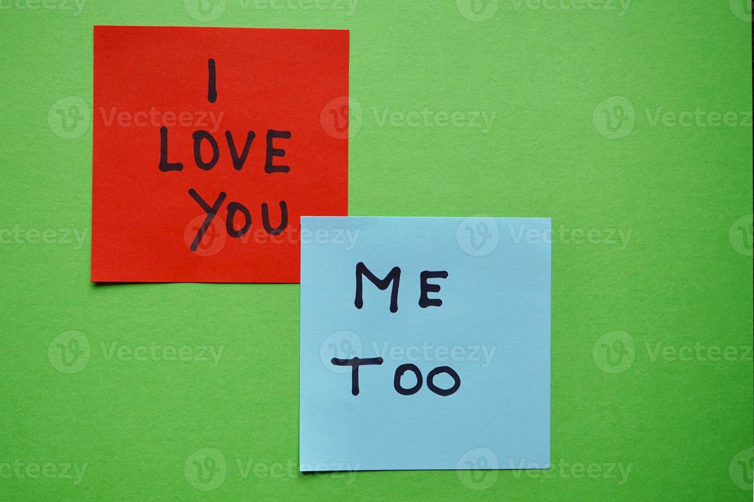 I love you written on a paper photo