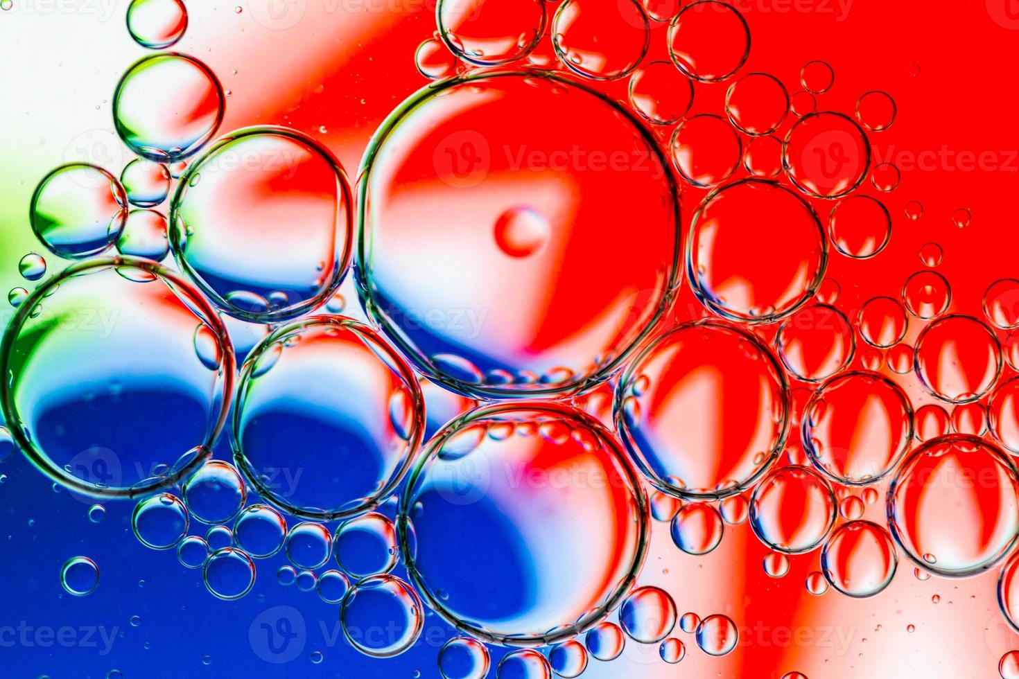 Abstract Background of Oil Bubbles on Water Surface red white blue palette photo