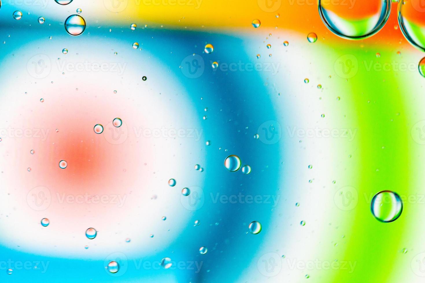 Abstract Background of Oil Bubbles on Water Surface colorful palette photo