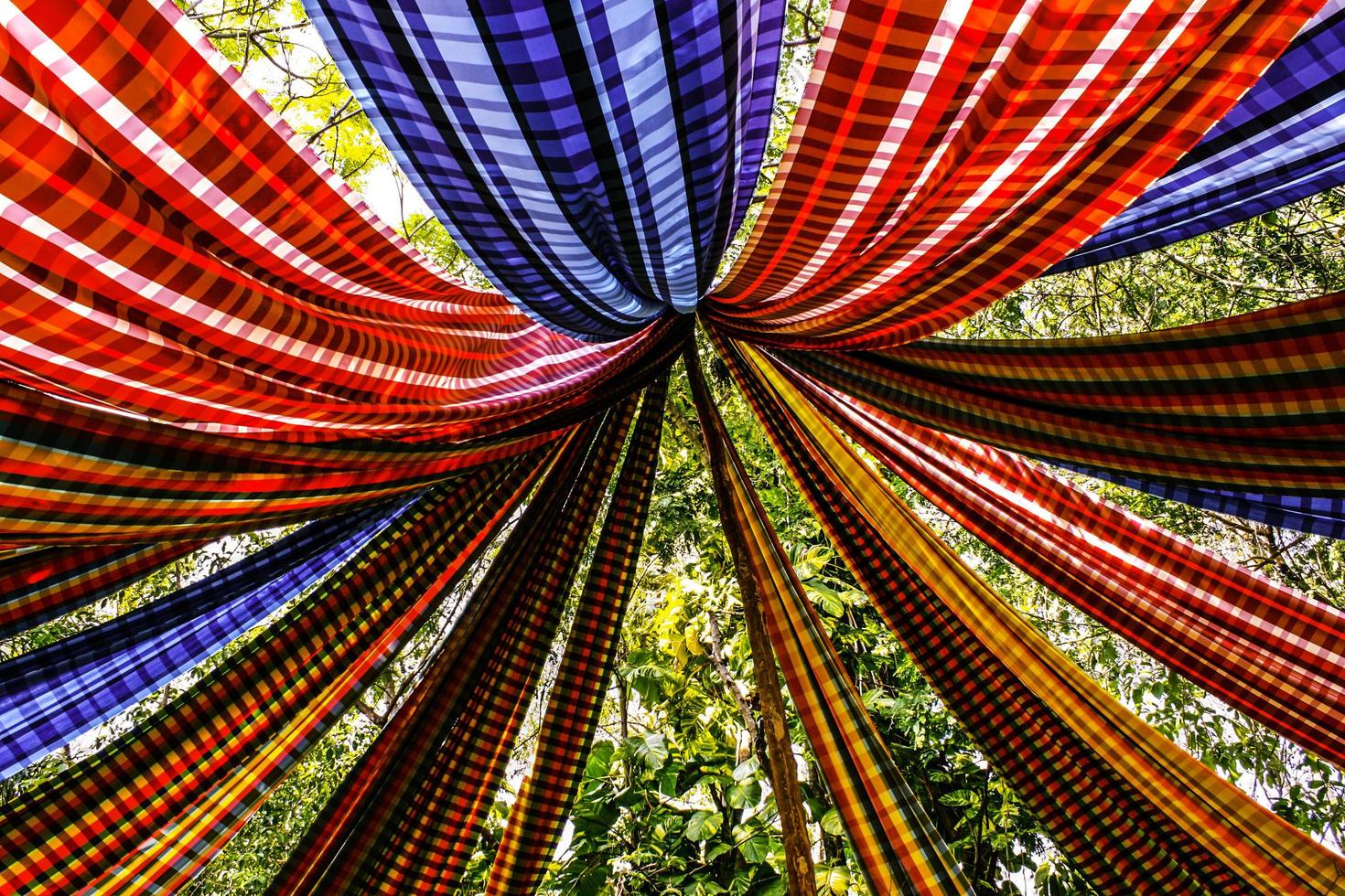 Colorful cloth with trees in the background photo