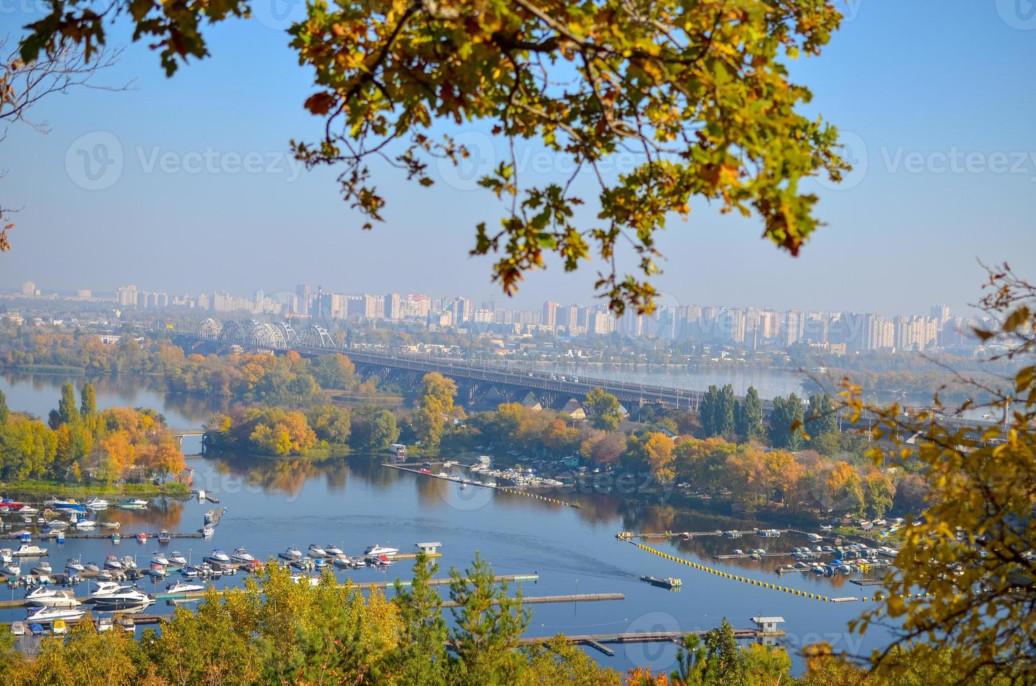 Panoramic view of district Podil and the Dnipro river in Kyiv at autumn photo