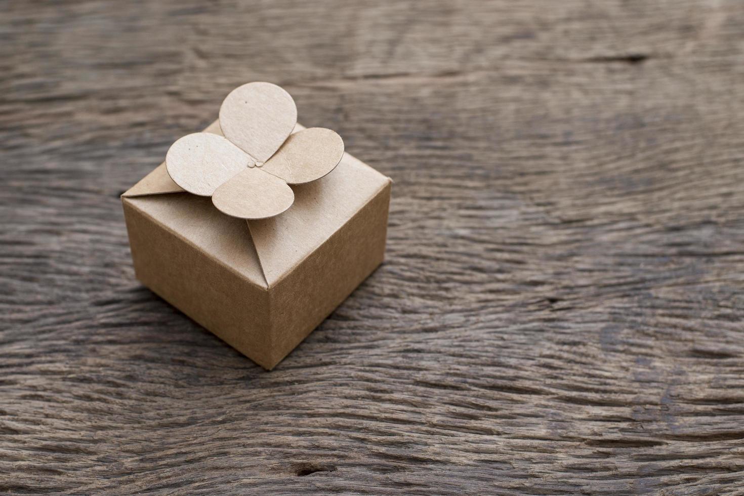 Vintage Gift box on wood background photo