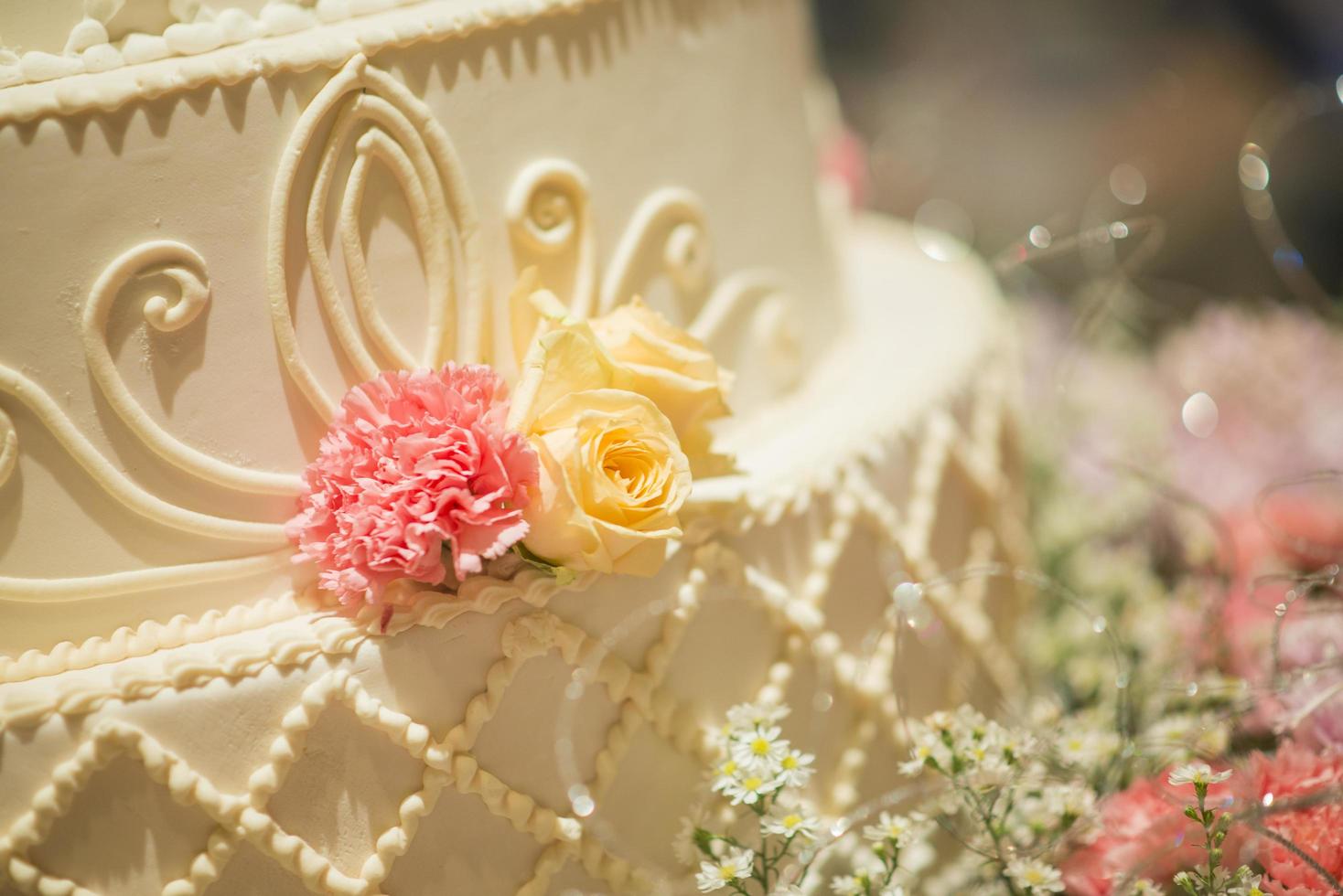 White wedding cake with flower photo