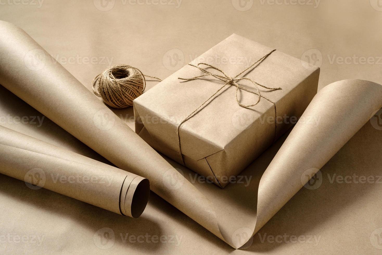 Gift wrapping from Kraft paper wrapped with twine Stock Photo by