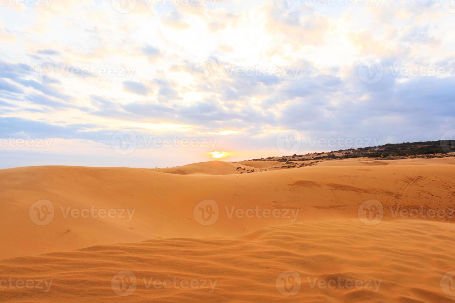 Red sand dune  Mui Ne sand dune and sunset at South Vietnam photo