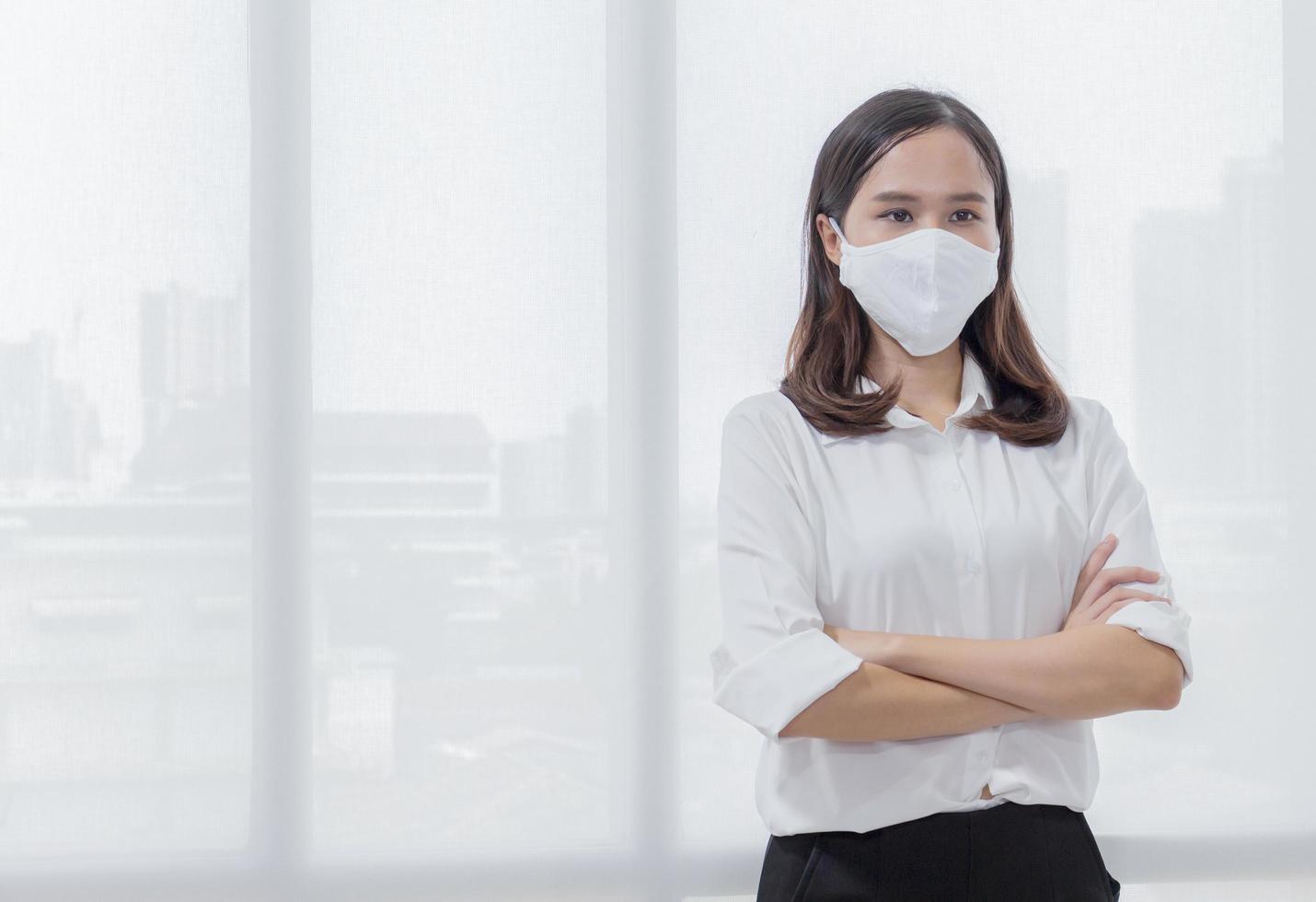 Woman wearing a mask to prevent infection Covid 19 photo