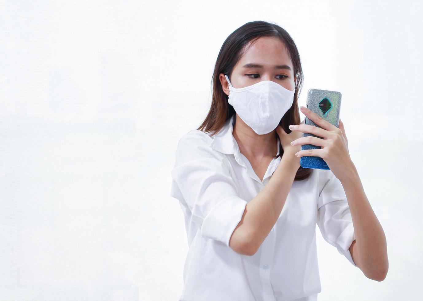 Woman wearing a mask to prevent infection Covid 19 photo