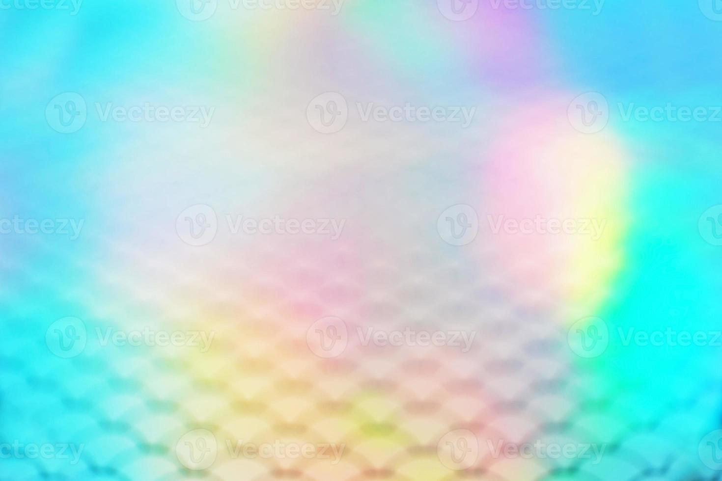 An amazing and vibrant macro of iridescent surface with scale texture as background photo