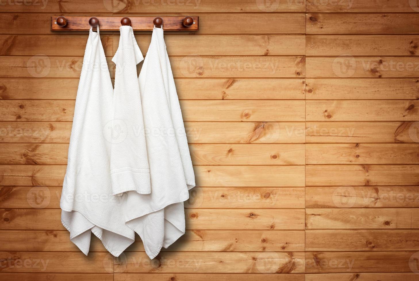 Clean towels on wall photo