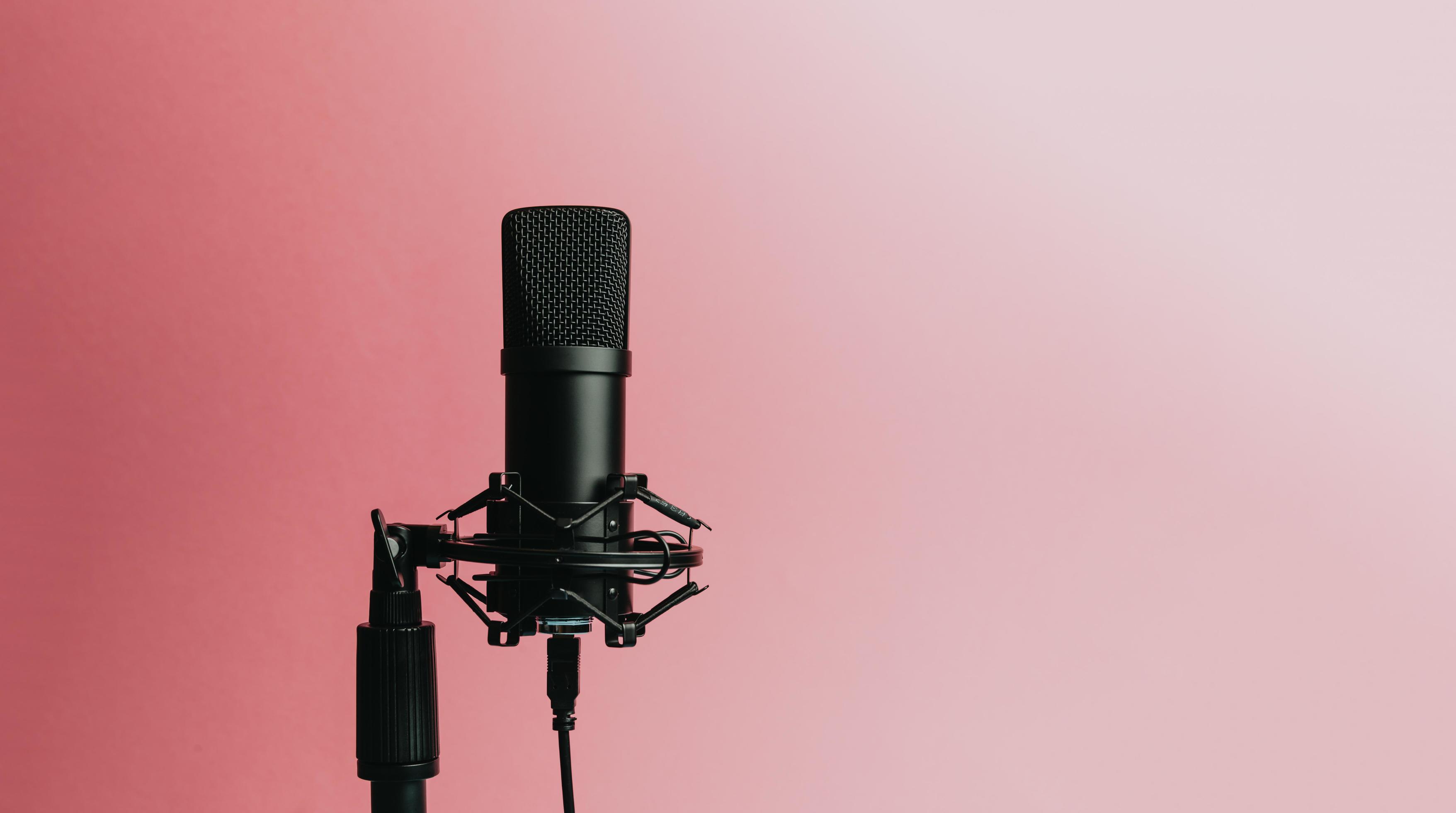 Download Streaming Microphone Over An Pastel Pink Background 2487987 Stock Photo At Vecteezy
