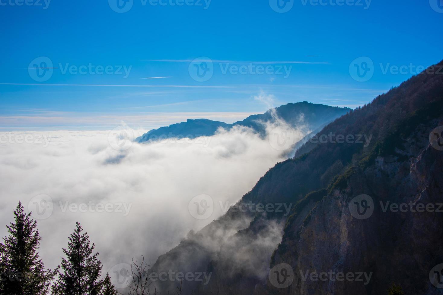 alpine peaks and clouds photo