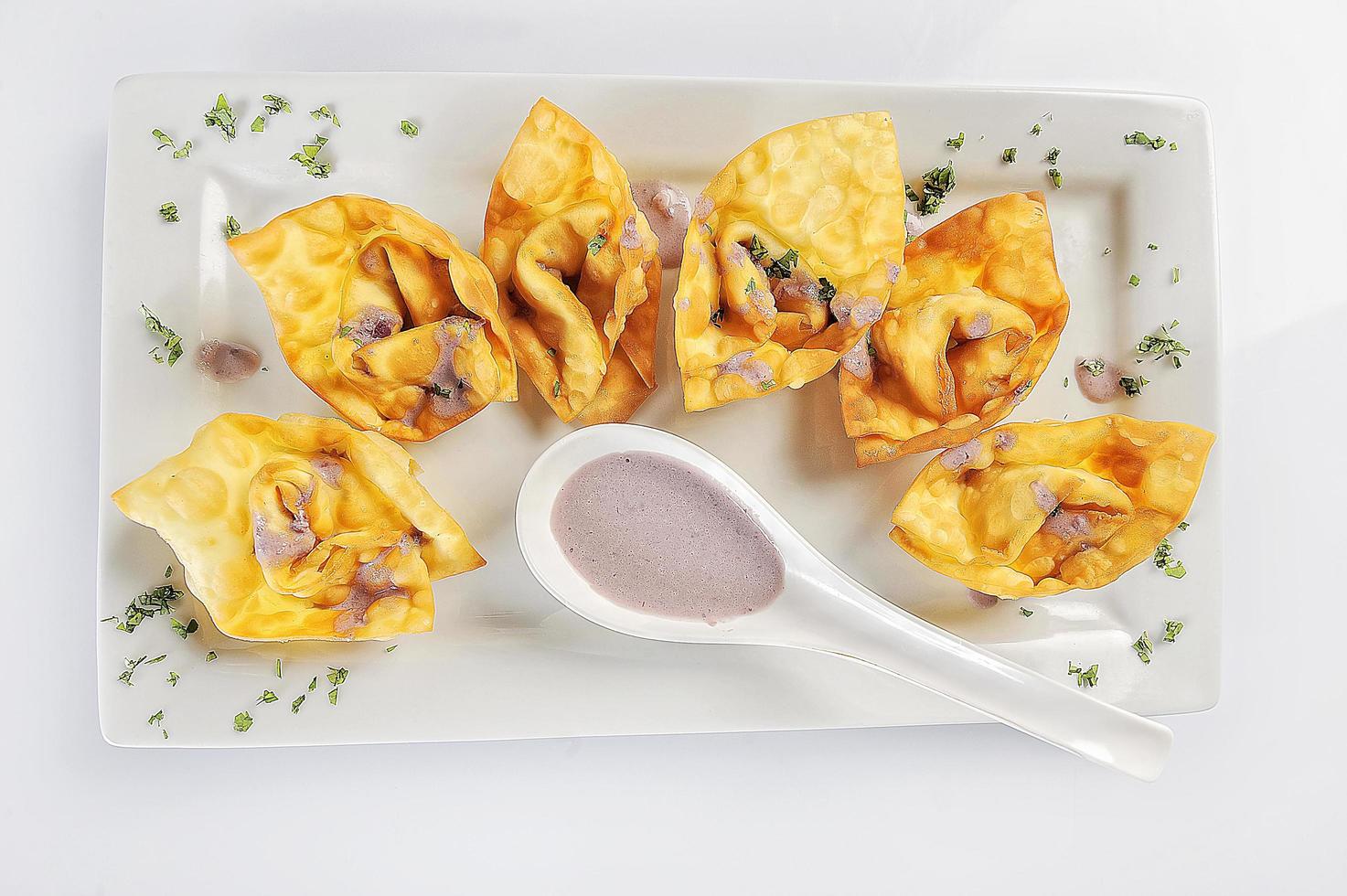 chifa fried peruvian wonton fusion food food display photo