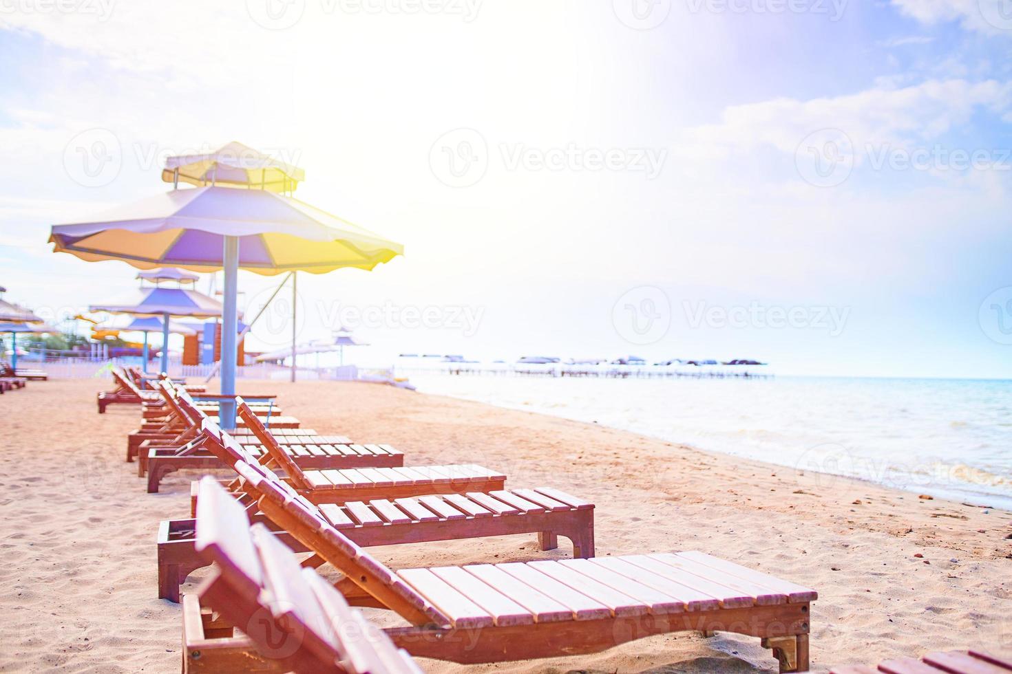 Sunbeds on the beach photo