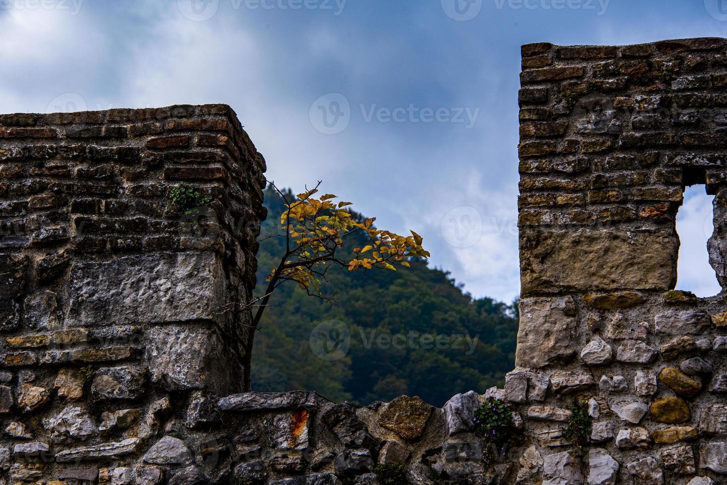 Stone walls with mountains photo