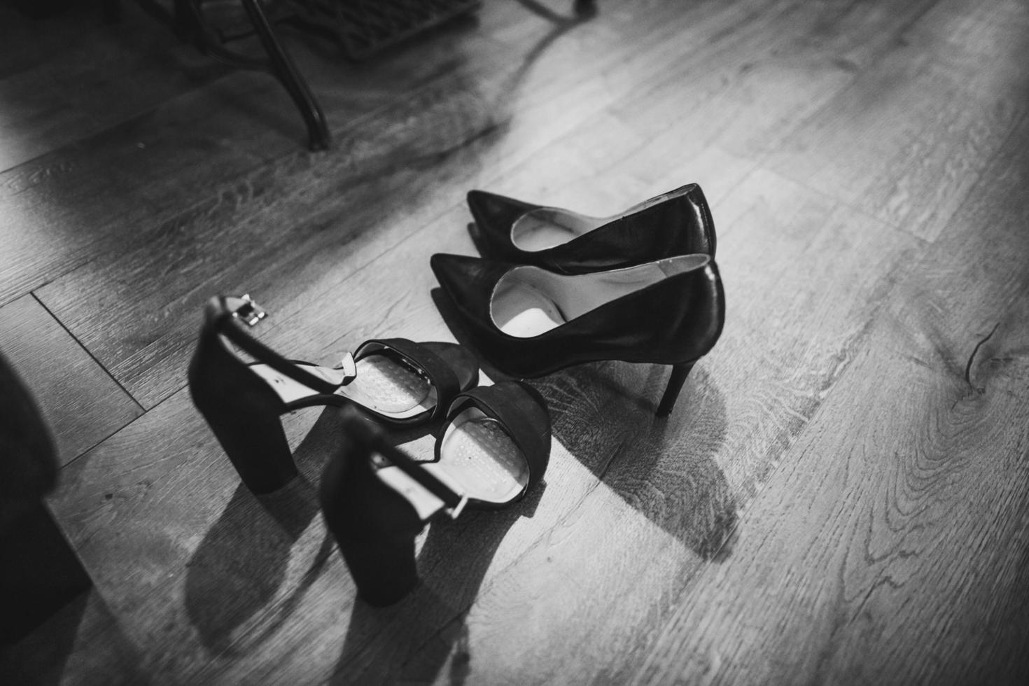 grayscale photography of pumps and stiletto sandals photo