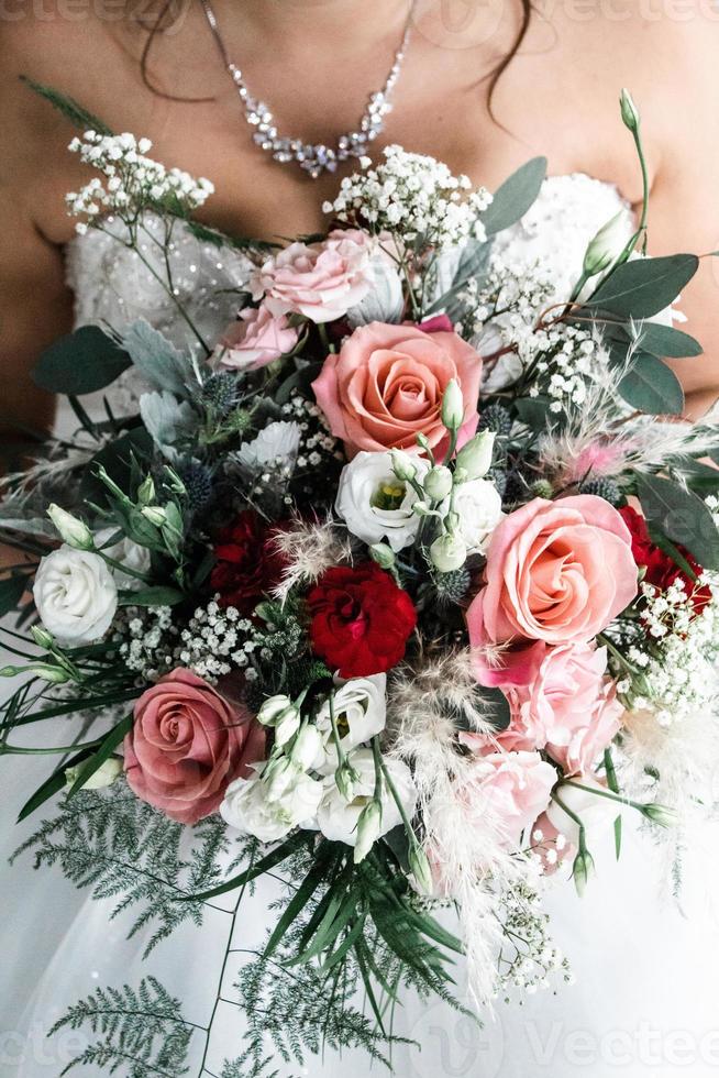 bridal wedding bouquet in pink and red photo