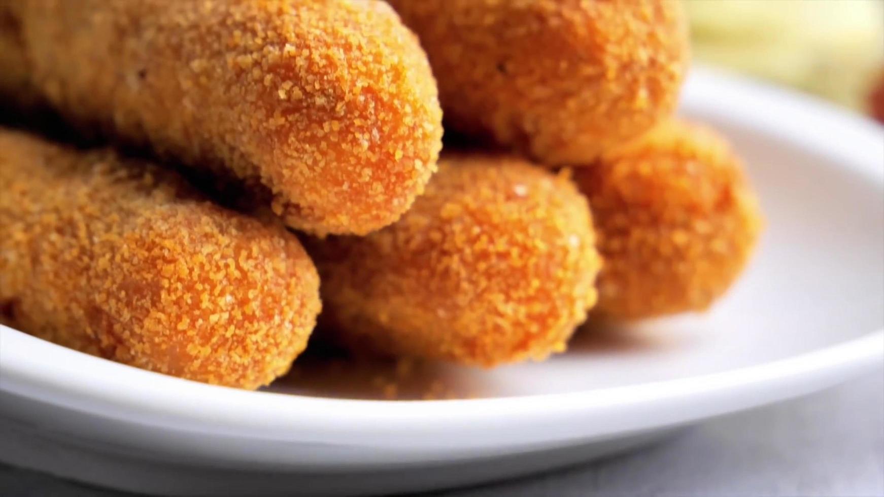 Closeup photography of crispy crunchy snacks served on white plate photo