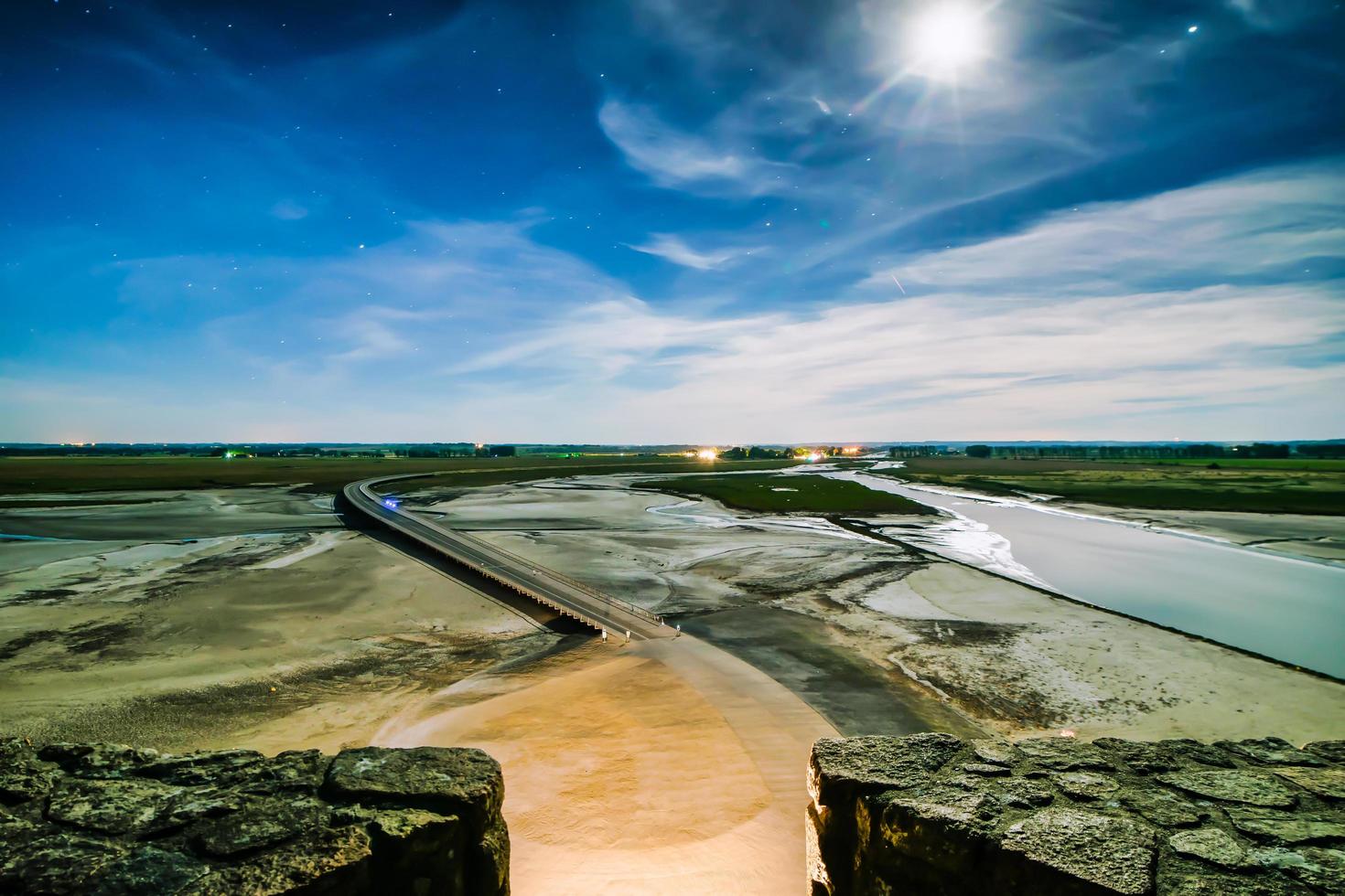 View from the top of mount Saint Michel at night in France photo