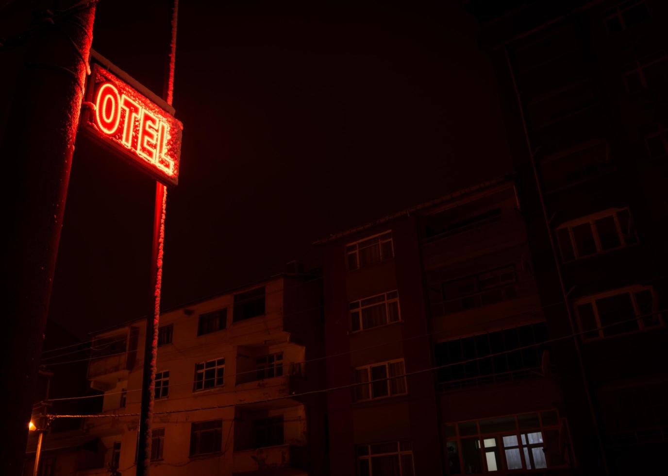 Hotel sign in hotel photo