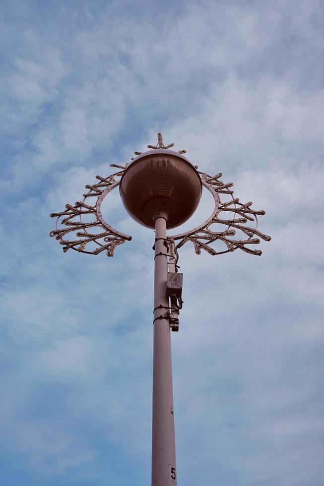 street lamp and blue sky photo