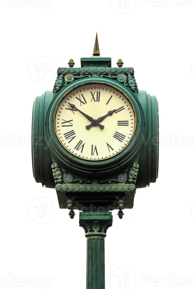 vintage style clock on pillar with roman numerals on white background photo