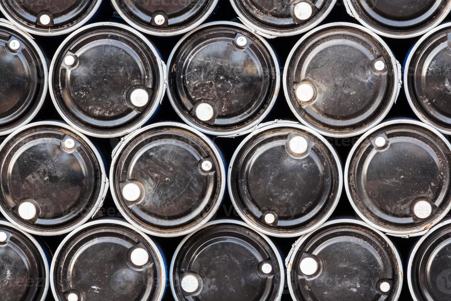 close up of black color oil barrels photo