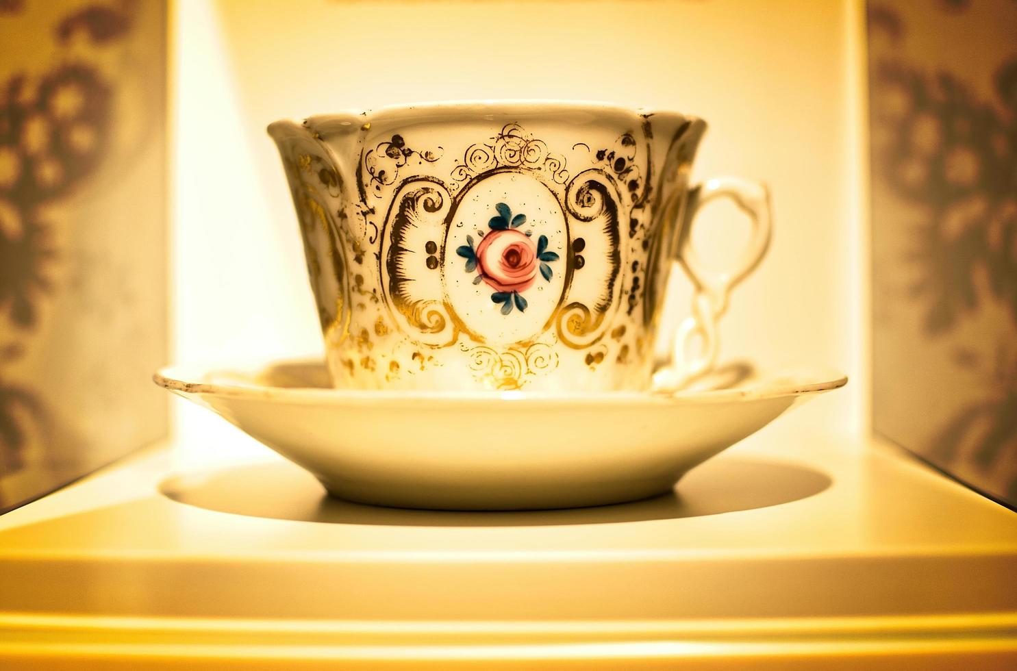 Retro cup with flower photo