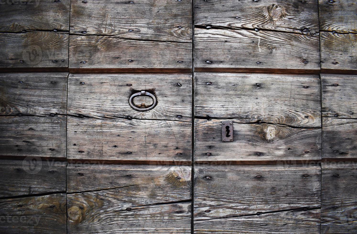 Closed brown wooden doors photo