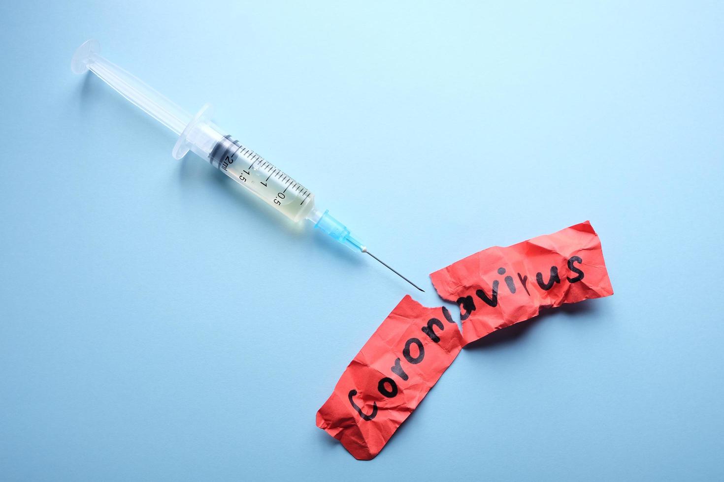 Close up image of a syringe photo