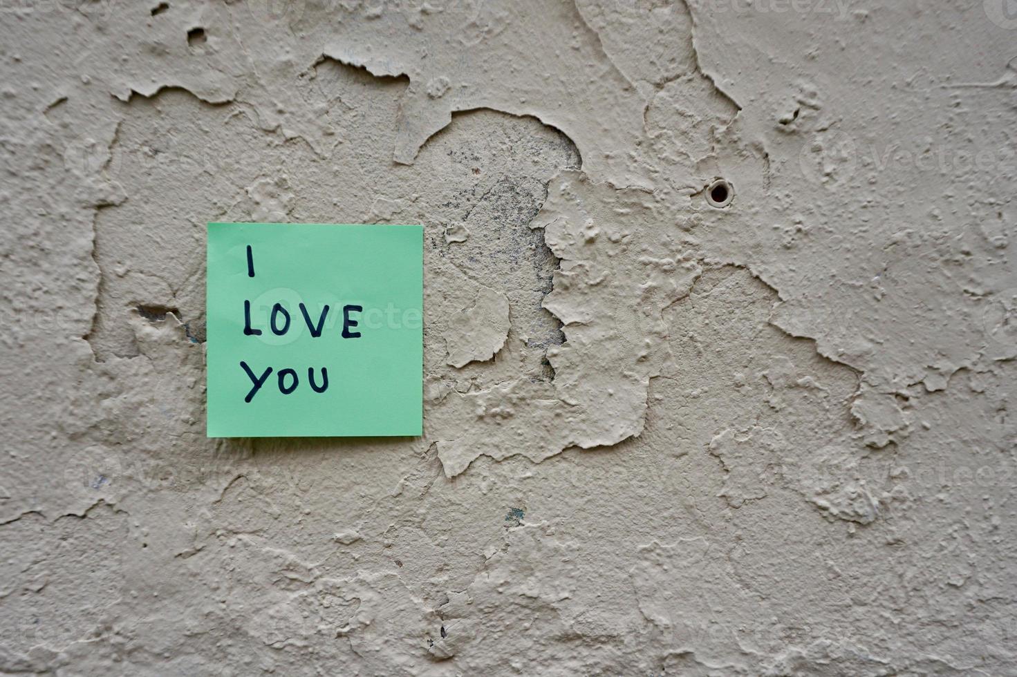 I love you message written on a paper photo