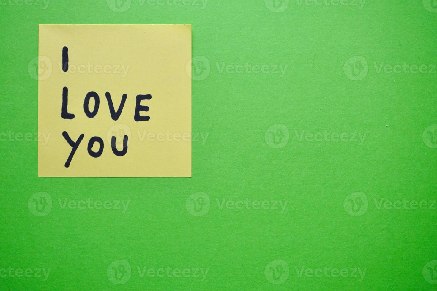 I love you message written on a paper photo