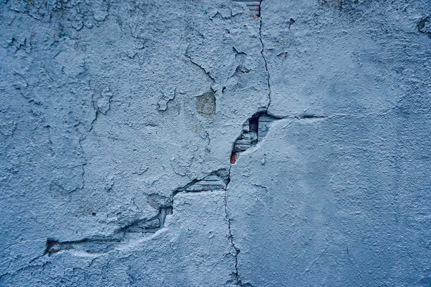 old blue stone wall textured background photo