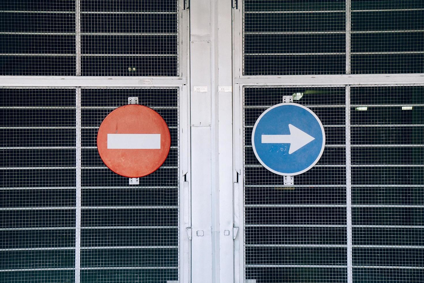 arrow traffic sign on the street photo