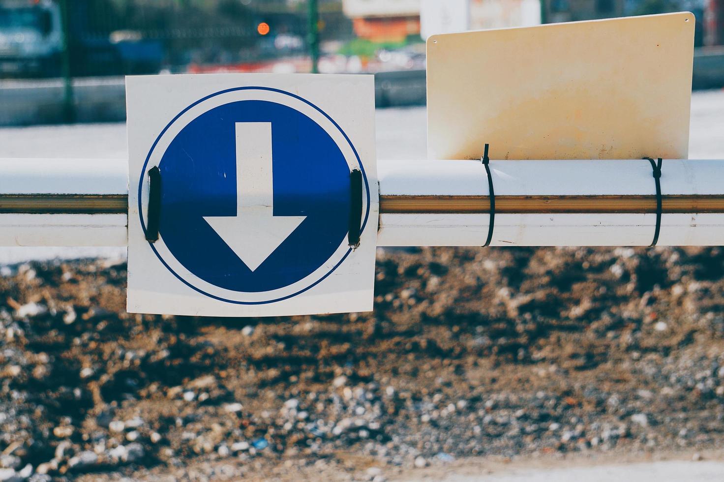 arrow traffic sign on the street photo