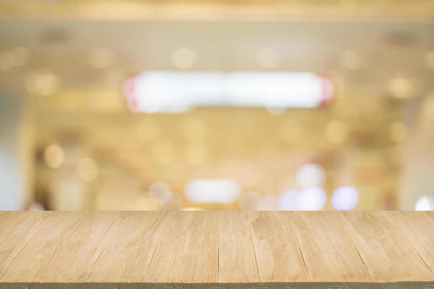 Wood floor with blur of bokeh of market background photo