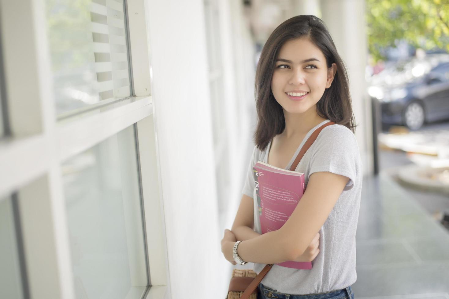 A portrait of an Asian university student on campus photo