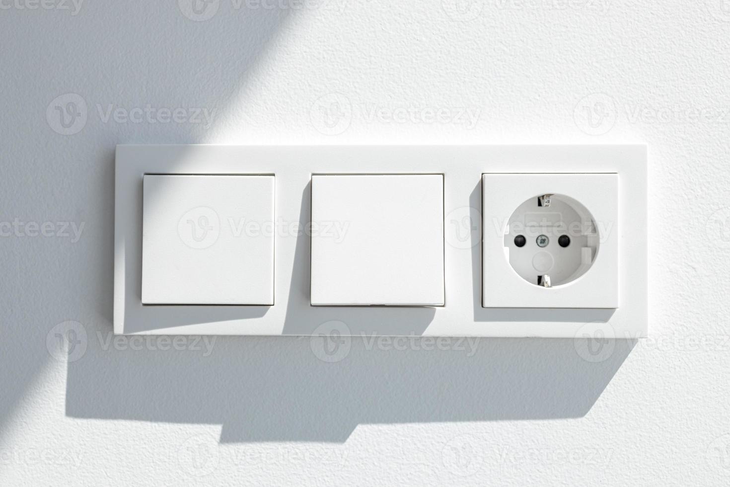 Modern white switch board with two switches and one European plug 2503822  Stock Photo at Vecteezy
