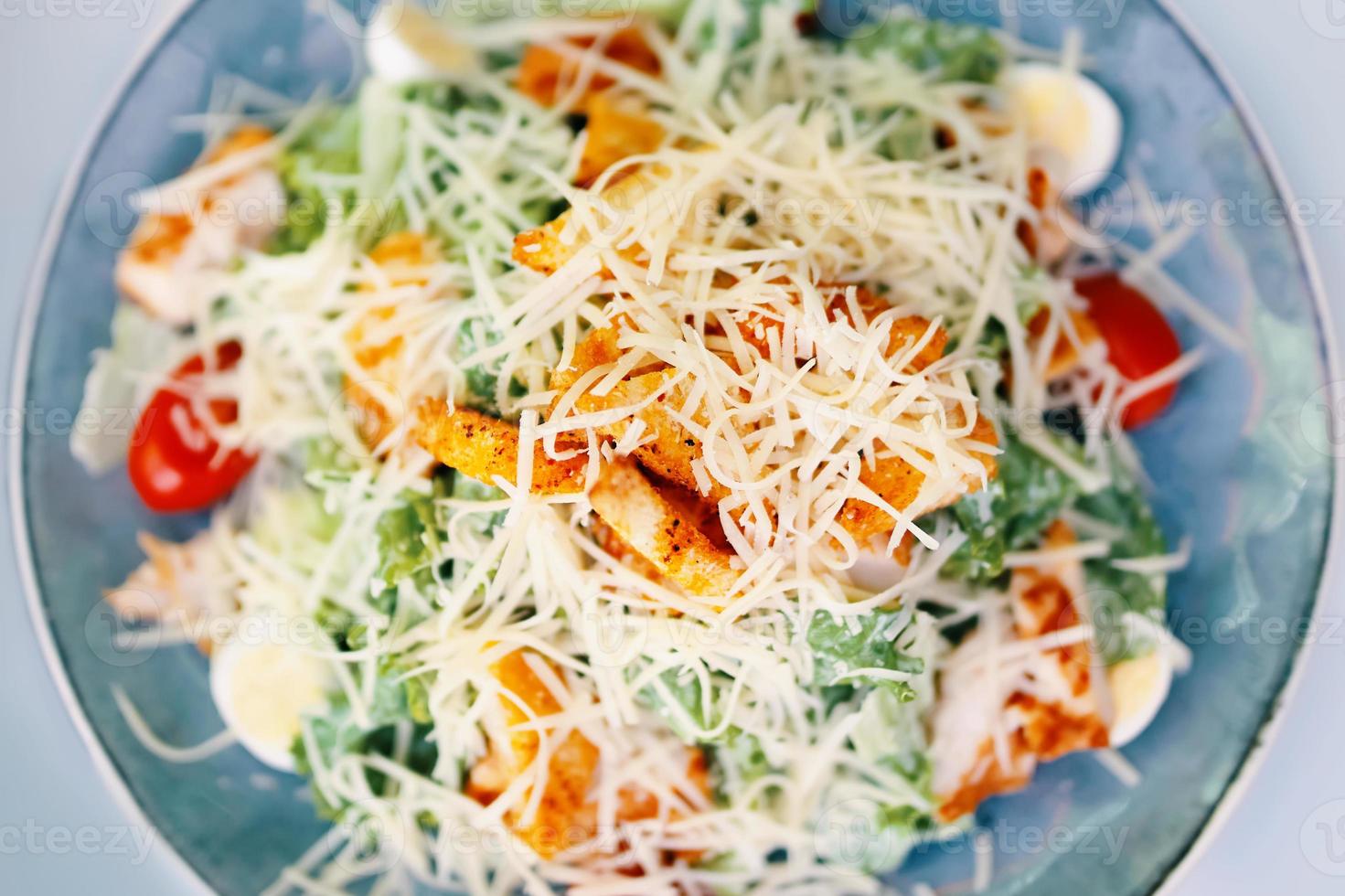 Meal of salad caesar on table photo