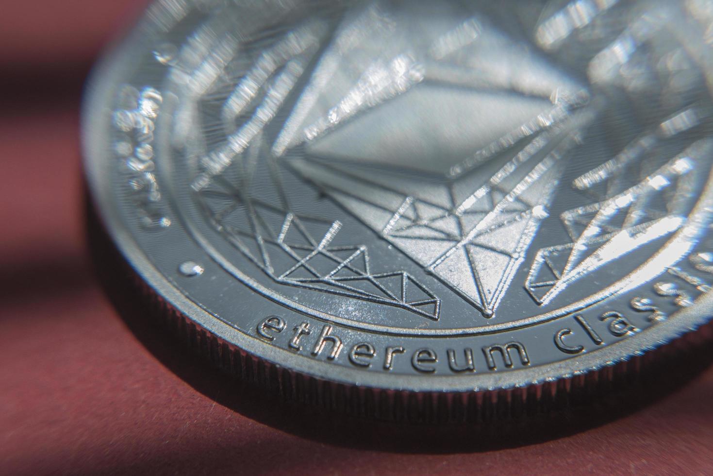ethereum Crypto currency ethereum currency ethereum on background of the red background photo