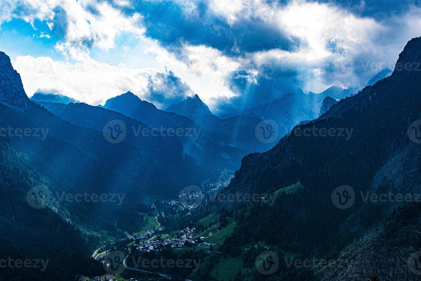 Rays of sun on a valley photo