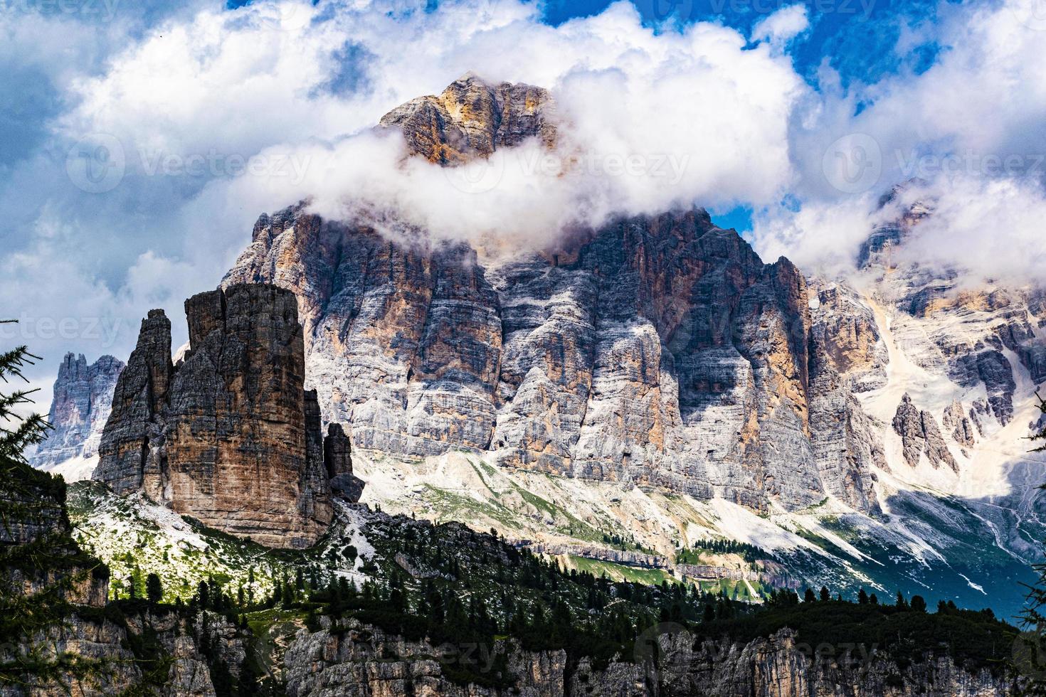 Dolomite mountains and clouds photo