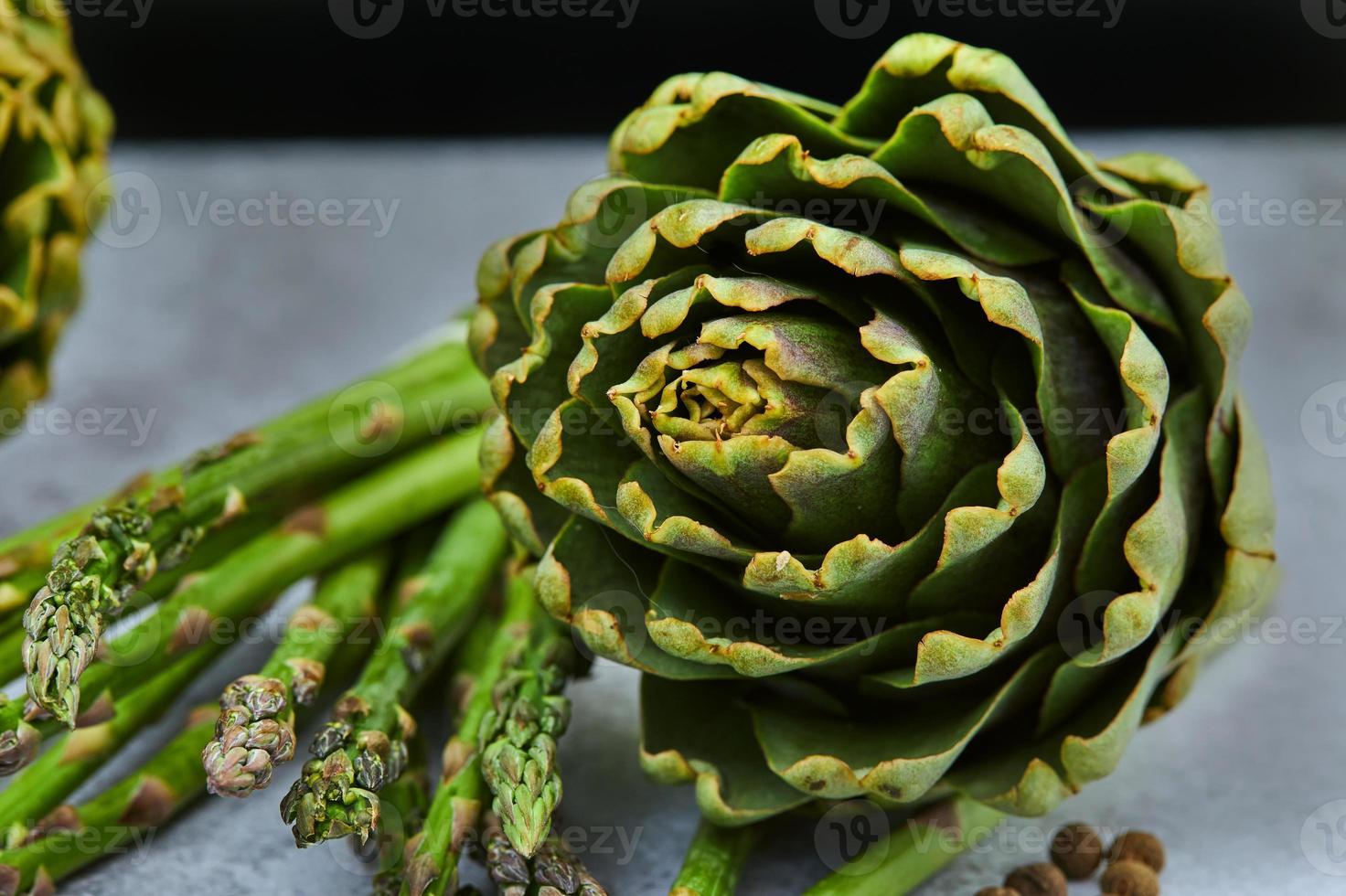 Asparagus and artichokes with herbs photo