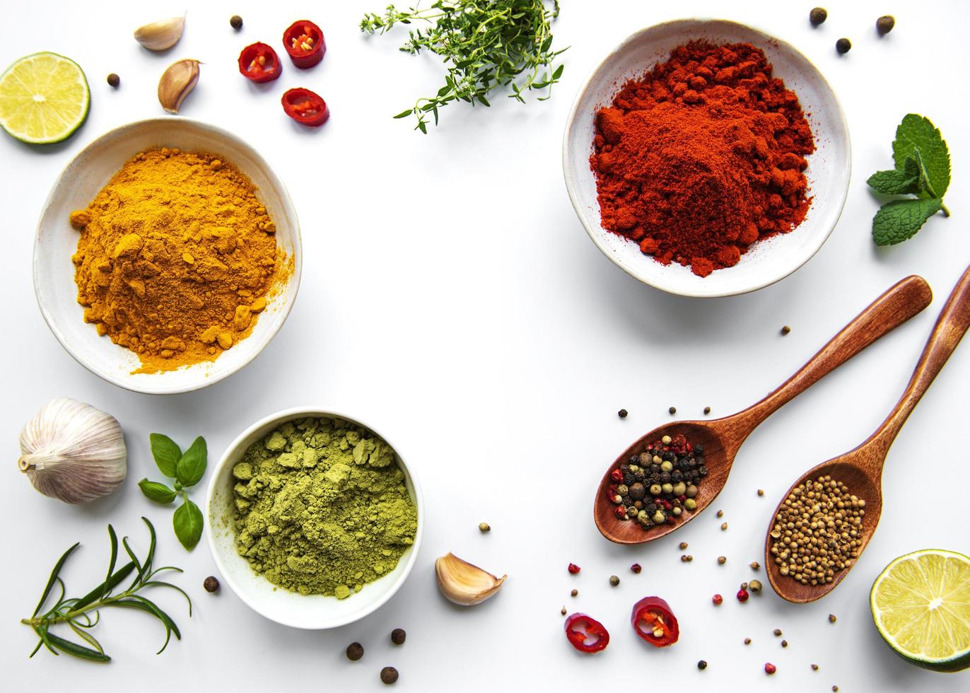 Various spices isolated on white background, top view photo