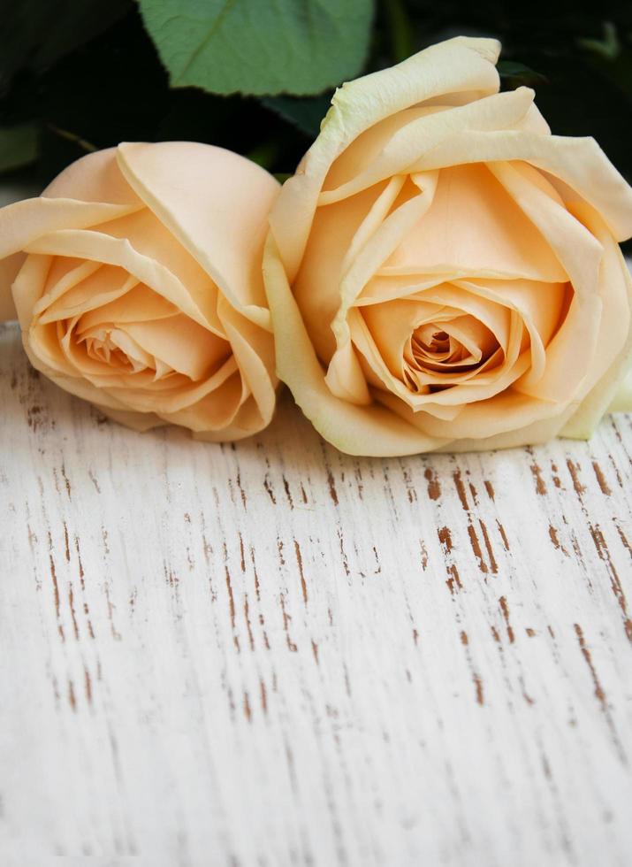 Roses on a wooden table photo