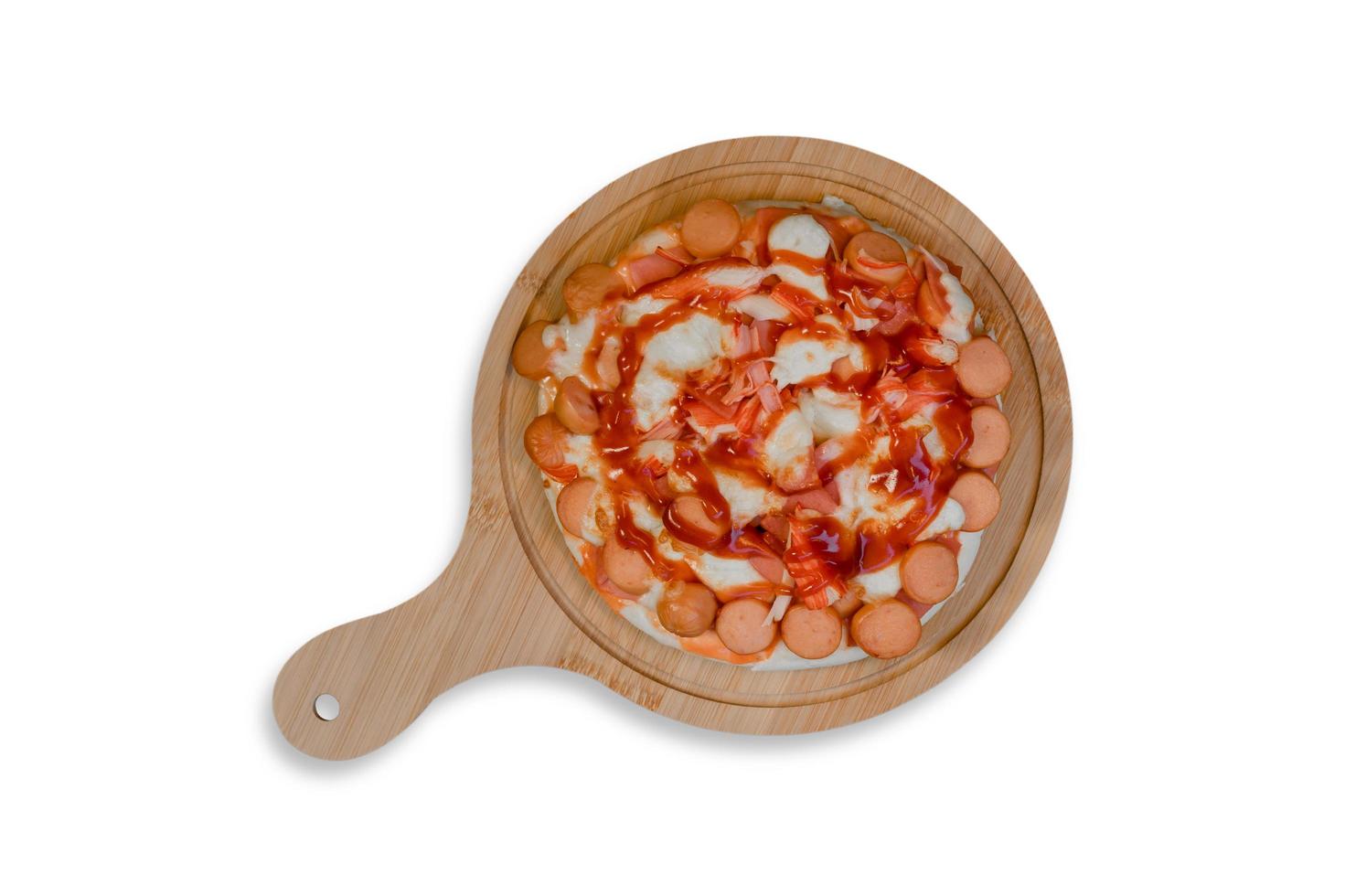 Top view of pizza on a wooden tray on a white background photo