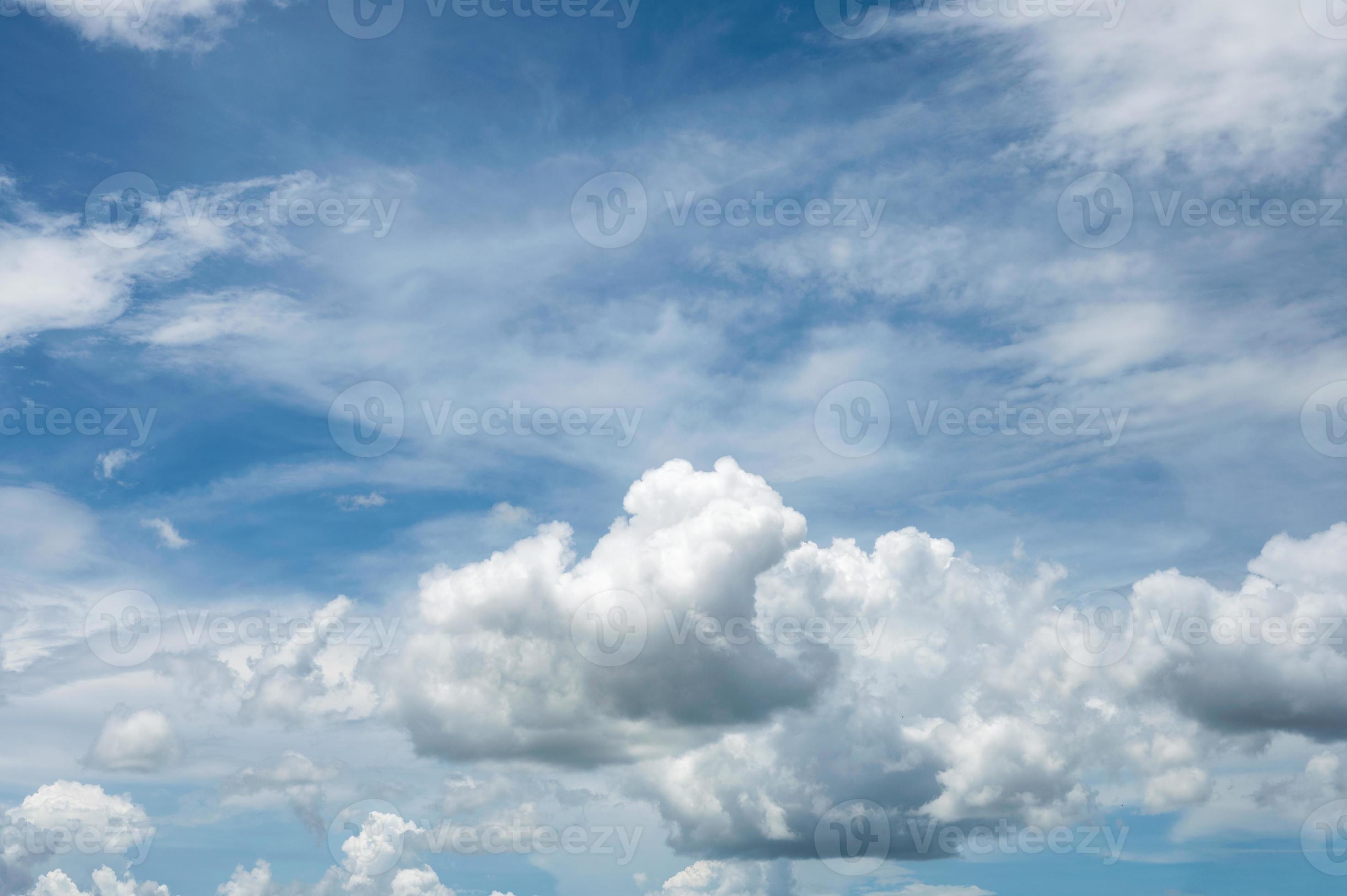 White fluffy clouds with blue sky photo